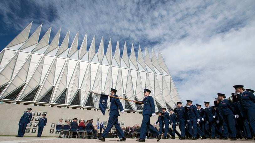 In this May 15, 2017 file photo, Air Force Academy Cadets pass in review after Brig. Gen. Kristin Goodwin assumed command of the AFA cadet wing at a ceremony at the Air Force Academy in Colorado Springs, Colo.