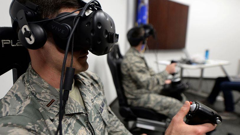 Second Lt. Kenneth Soyars, 14th Student Squadron student pilot, takes off during a virtual reality flight simulation Jan. 10 at Columbus Air Force Base, Miss. Two subjects flew at a time, but no other subjects were allowed to watch or learn from other individuals’ sorties. The Adaptive Flight Training Study pushed subjects to learn through the VR technology. (U.S. Air Force photos/Airman 1st Class Keith Holcomb)