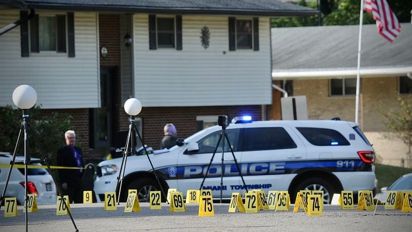 Evidence markers cover Verdi Drive in Miami Twp. after a multiple shots were fired Tuesday, Sept. 26, 2023. MARSHALL GORBY \STAFF