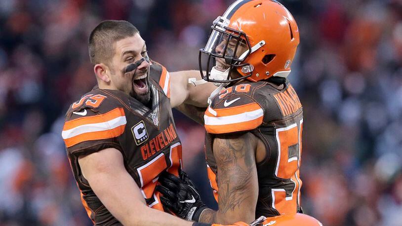 The Cleveland Browns' Tank Carder, left, and Christian Kirksey celebrate a 20-17 win against the San Diego Chargers on December 24, 2016, at FirstEnergy Stadium in Cleveland. (Phil Masturzo/Akron Beacon Journal/TNS)