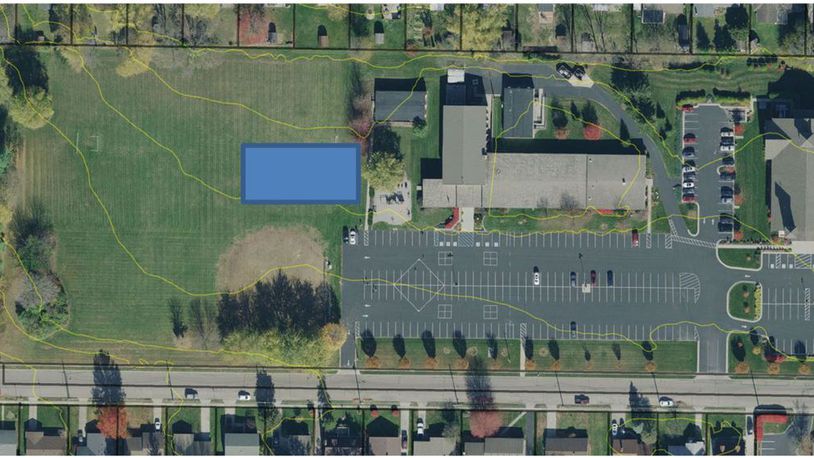 The blue box on this aerial photo of St. Francis DeSales Catholic Church campus illustrates the location of a new 9,730 square-foot parish center will be located. The Lebanon Planning Commission approved the project to move forward. The parish will also build a new playground on the site. The sanctuary is on the right, parallel to North Broadway, and the school is in the middle of the campus. CONTRIBUTED/CITY OF LEBANON
