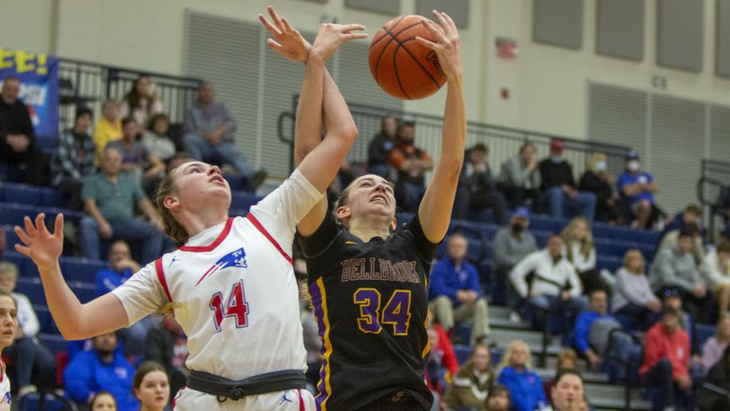 Bellbrook's Ashley Frantz (34) battles Tri-Village's Morgan Hunt for a rebound during the first half of Saturday's game at Flyin' To The Hoop at Trent Arena. Jeff Gilbert/CONTRIBUTED