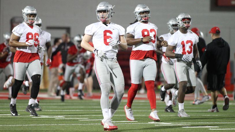 Ohio State players, including Sam Hubbard (6) and Tracy Sprinkle (93), practice on Tuesday, March 6, 2017, at the Woody Hayes Athletic Center in Columbus. David Jablonski/Staff