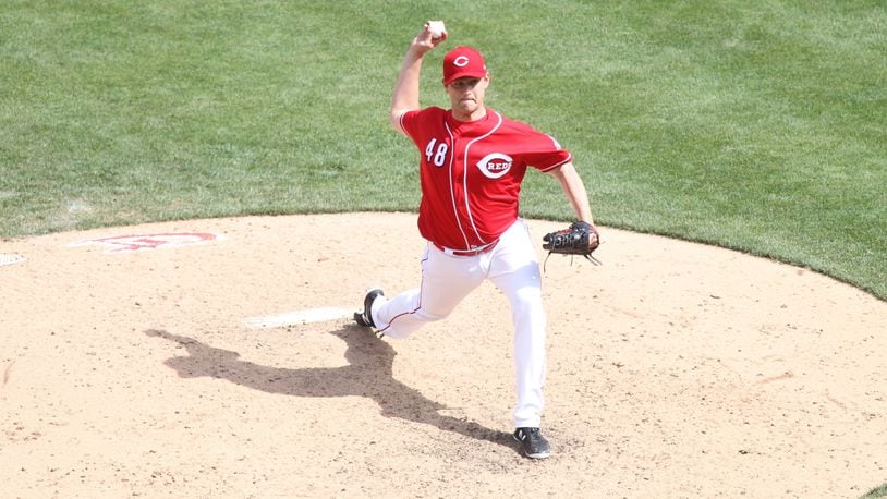 Reds reliever Jared Hughes pitches against the Cardinals on June 10, 2018, at Great American Ball Park in Cincinnati. David Jablonski/Staff