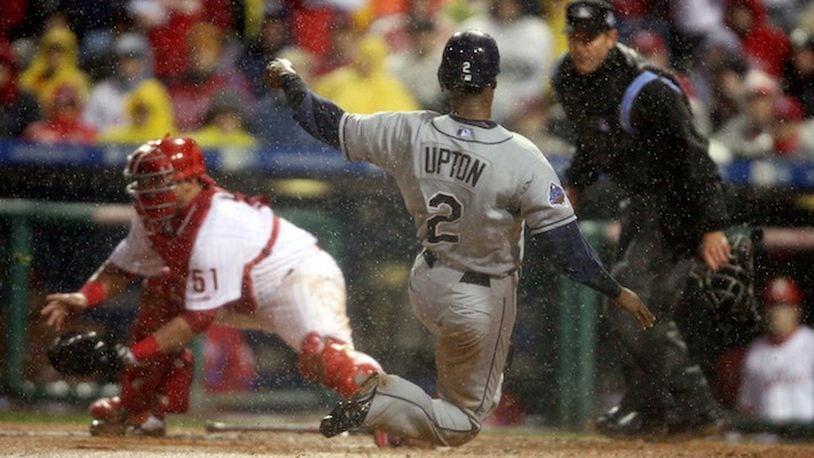 Tampa Bay Rays B.J. Upton scores on a Carlos Pena single to left center against the Philadelphia Phillies on Oct. 27, 2008. (Gary W. Green/Orlando Sentinel/TNS)