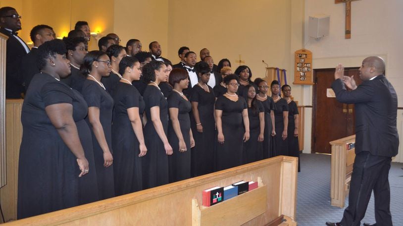 Jeremy Winston directs Central State Chorus in a performance at St. Andrews Episcopal Church in Dayton. CONTRIBUTED