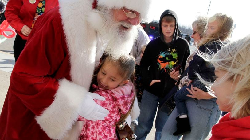 Santa Claus arrives at the Upper Valley Mall in Springfield. Staff photo