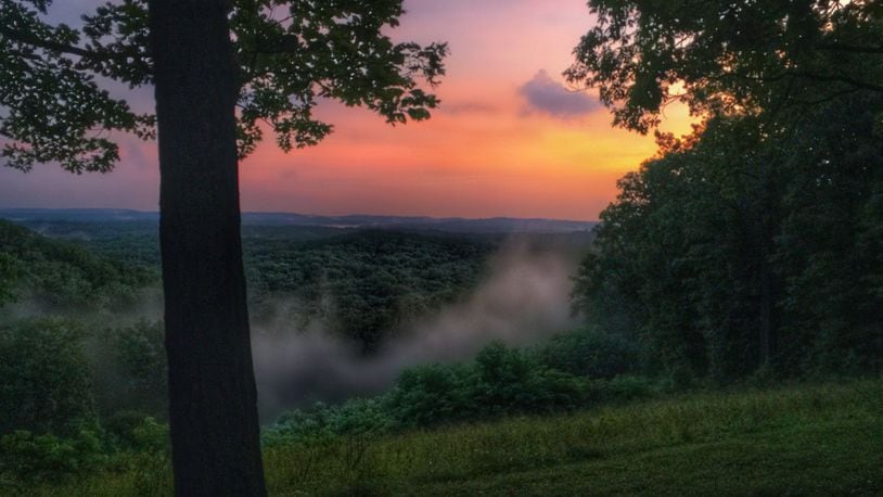 Hesitation Point is one of the vistas at Brown County State Park. Natural fog blankets the rolling hills at dawn. CONNIE POST/STAFF