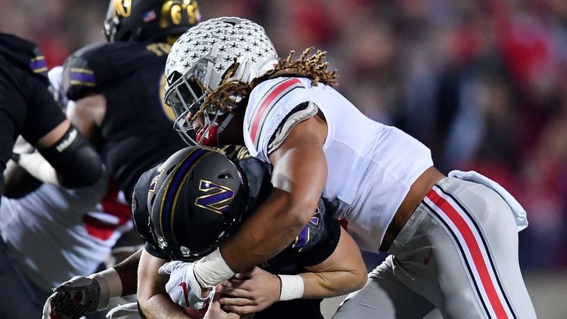 EVANSTON, ILLINOIS - OCTOBER 18: Chase Young #2 of the Ohio State Buckeyes sacks Aidan Smith #11 of the Northwestern Wildcats in the first quarter at Ryan Field on October 18, 2019 in Evanston, Illinois. (Photo by Quinn Harris/Getty Images)