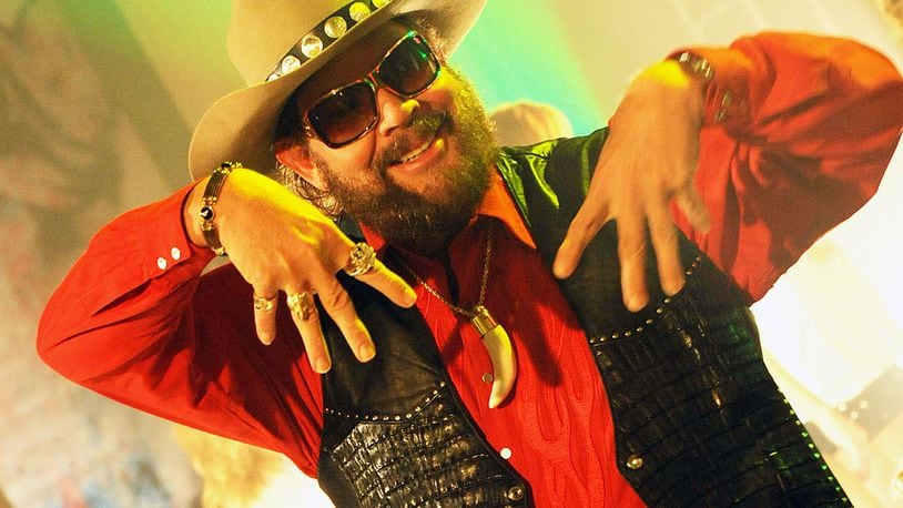 NASHVILLE, TN - JUNE 22: Hank Williams Jr. chats with extras during a break from taping the opening of the 40th Anniversary of Monday Night Football at Centennial Park in the Parthenon on June 22, 2009 in Nashville, Tennessee. (Photo by Rick Diamond/Getty Images)