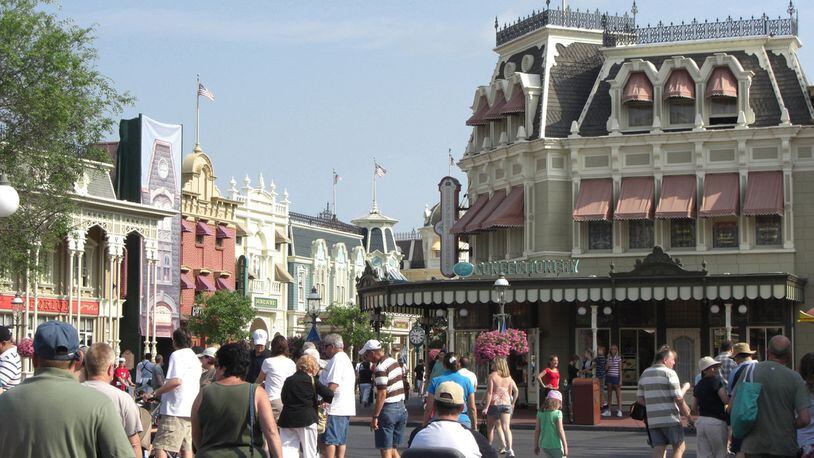 Main Street at Disney’s Magic Kingdom in Orlando, Fla. Disney World is changing its ticket structure, moving to date-based pricing. (James Lileks/Minneapolis Star Tribune/TNS)