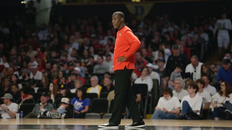 Dayton's Anthony Grant coaches during a game against Vanderbilt in the second round of the NIT on Sunday, March 20, 2022, at Memorial Gymnasium in Nashville, Tenn. David Jablonski/Staff