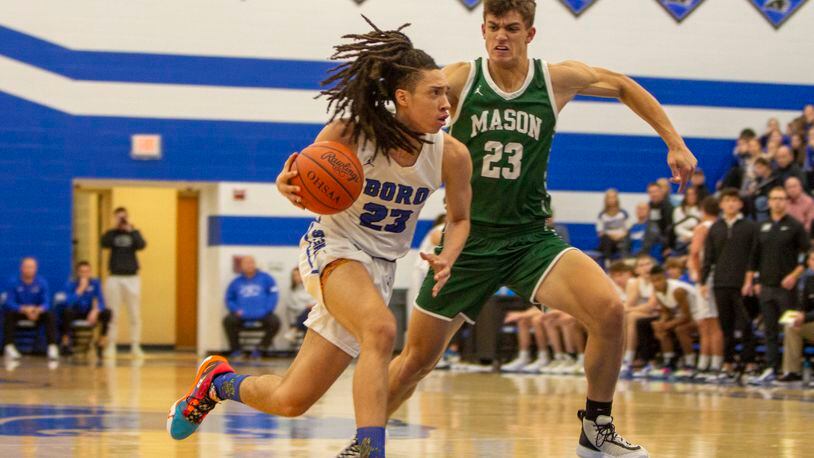 Springboro sophomore Jerome White drives toward the basket during Tuesday's game against Mason. CONTRIBUTED/Jeff Gilbert