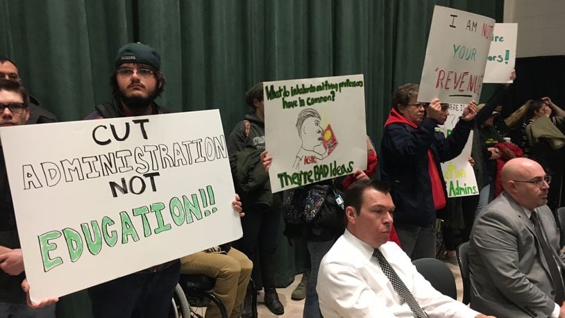 FILE: Wright State University students protested on Friday, April 7, 2017, before officials announced it will begin immediately cutting expenses campus wide to meets its goal of $25 million reduction goal. Students held signs, such as Release the Audit and Cut Administration Not Education, critical of the decisions. JOSH SWEIGART / STAFF