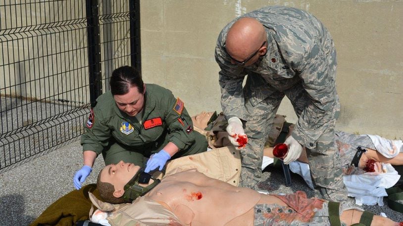 A member of the C-STARS cadre prepares a ‘patient’ for a training simulation exercise during Tactical Critical Care Evacuation Team Training at the Cincinnati Center for Sustainment of Trauma and Readiness Skills. (Contributed photos)