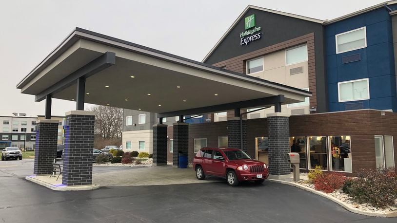 The Holiday Inn Express and Suites, 120 Senate Drive, Monroe, recently held its ribbon-cutting to celebrate $2 million in renovations. RICK McCRABB/STAFF