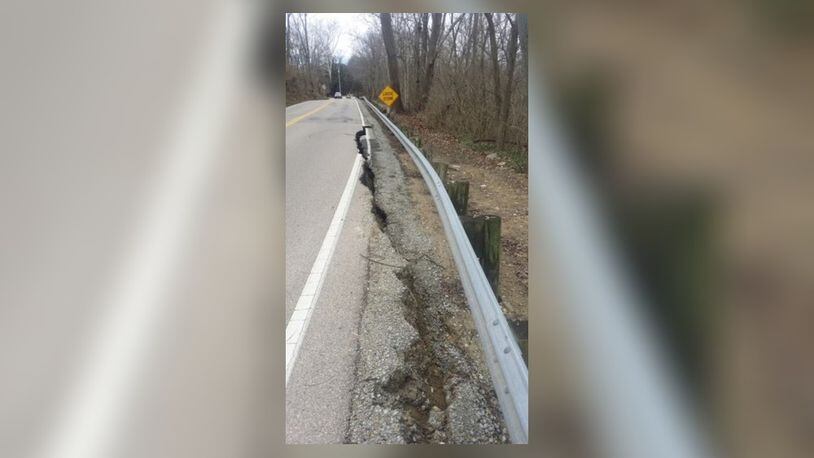The area’s significant rainfall from last weekend is believed to be the cause that led to part of Little Sugarcreek Road, just north of Ohio 725 in Bellbrook, to fall away.