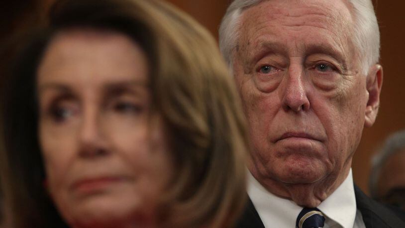 U.S. Speaker of the House Rep. Nancy Pelosi (D-CA) (L) and House Majority Leader Rep. Steny Hoyer (D-MD) (R) listen during a news conference at the U.S. Capitol January 30, 2019 in Washington, DC. House Democrats held a news conference to introduce the “Paycheck Fairness Act.” (Photo by Alex Wong/Getty Images)