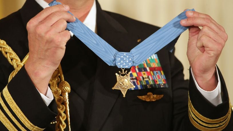 WASHINGTON, DC - FEBRUARY 29:  The Medal of Honor that will be awarded to Navy Senior Chief Edward Byers Jr., is displayed during the ceremony in the East Room of the White House February 29, 2016 in Washington, DC. A member of Navy SEAL Team 6, Byers received the Medal of Honor for his role in rescuing an American hostage from the Taliban in Afghanistan in December 2012.  (Photo by Chip Somodevilla/Getty Images)