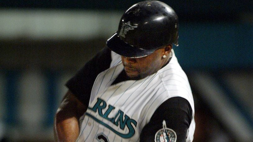 Cliff Floyd (30), a member of what was then the Florida Marlins, hits a pop fly during the fifth inning against the Detroit Tigers on Saturday, June 22, 2002 at Pro Player Stadium. (Richard Patterson/Miami Herald/TNS)