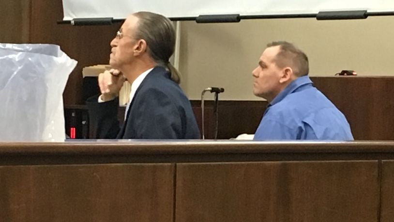 Ted Mullins (right) and his attorney in court Tuesday during Mullins’ trial on charges of the rape and kidnapping of a woman in Kettering in 2009.