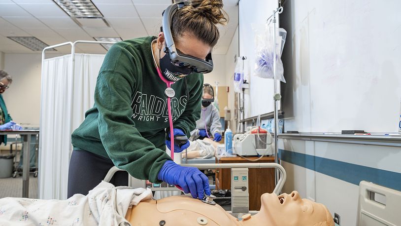 Wright State University nursing students use augmented reality to better assess patients, with virtual hearts, lungs and other internal body parts coming to life to enhance the learning experience. Contributed photo/Wright State University