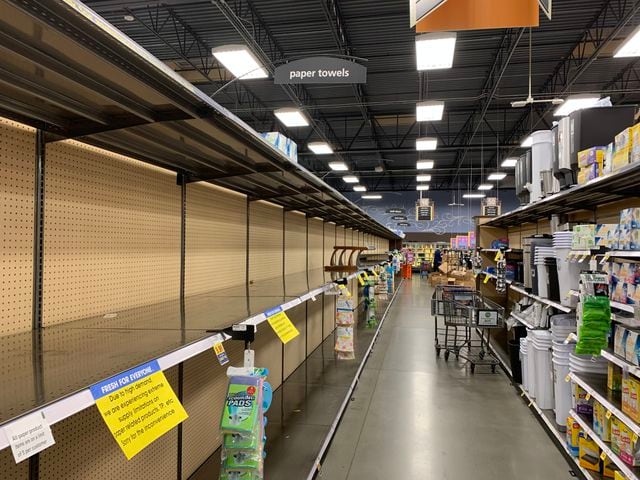 PHOTOS: Long lines, empty shelves at local grocery stores