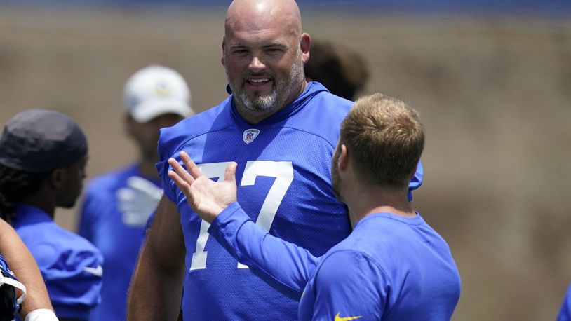 Los Angeles Rams head coach Sean McVay, right, talks with offensive tackle Andrew Whitworth during an NFL football practice Tuesday, June 8, 2021, in Thousand Oaks, Calif. (AP Photo/Mark J. Terrill)