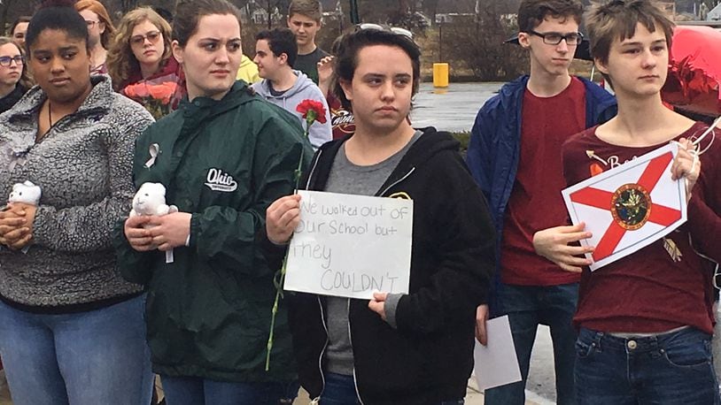 Students at the Dayton Regional STEM School walked out of school Wednesday, Feb. 21, 2018, in memory of the 17 individuals who died during the mass shooting at Marjory Stoneman Douglas High School in Parkland, Fla. WILL GARBE / STAFF