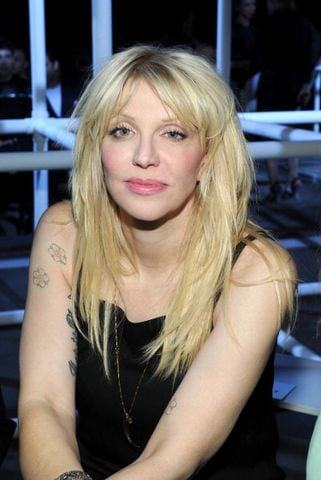 Courtney Love changed her nose that she could look LESS like her dad!