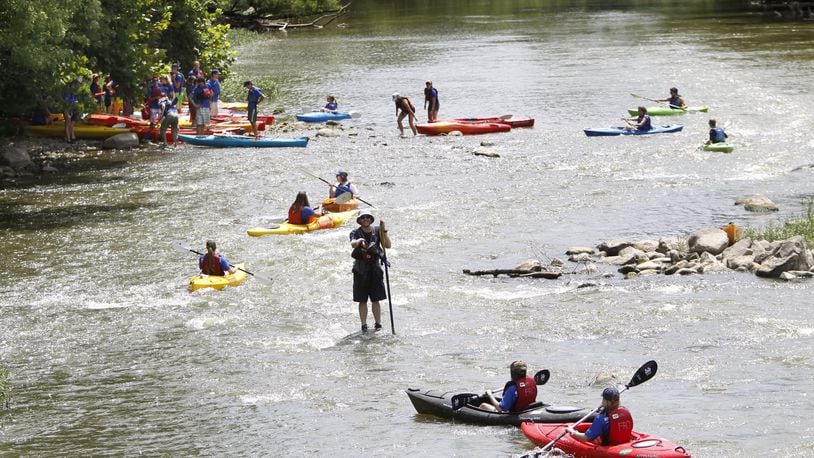 Tour de Way, a new passport program from the Great Miami Riverway, is offering more than $3,000 in prizes to those who scan QR codes with a smartphone at certain locations while paddling or using the trail system through March 2020. LISA POWELL / STAFF