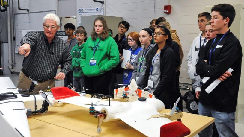 Rick Patton, Autonomous Navigation Technology Center engineer, describes different types of remotely piloted aircraft to local students during the Air Force Institute of Technology’s “Demo Days” April 2. (U.S. Air Force photo/Airman 1st Class Emily Woodring)
