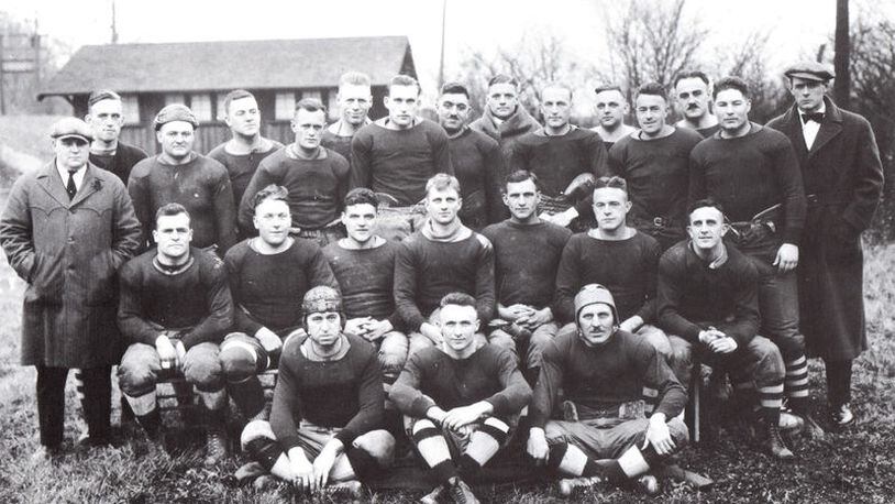 The Dayton Triangles football team (1920-1929) played in the first game for what is now known as the National Football League (NFL). The Triangles beat the Columbus Panhandles 14-0 on Oct. 3, 1920 in Dayton s Triangle Park. During the course of the game, the Triangles  Lou Partlow scored the first touchdown and George  Hobby  Kinderline kicked the point after, making NFL history. The Triangles were made up of weekend players, like most of the early NFL teams. Their manager Carl Storck participated in the formation of the NFL at Ralph Hays Hupmobile dealership in Canton in 1920; in 1921 he was named league secretary-treasurer; and in 1939 he became president of the NFL. In 1929 the Triangles franchise was sold and moved to Brooklyn, New York. The present-day Indianapolis Colts can trace their ancestry to the original Dayton Triangles. Although many relocations, name changes and thrilling NFL games have transpired since then, Dayton can be proud of the Triangles' role in the start of it all. (Inducted: 2008)