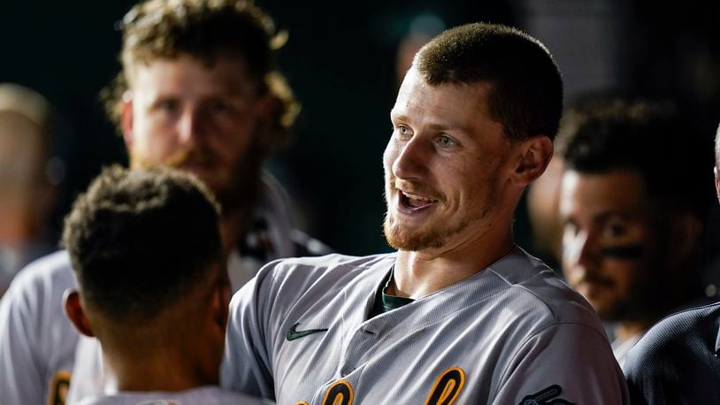 Oakland Athletics' Sean Murphy, center, smiles after his grand slam during the fifth inning of the team's baseball game against the Washington Nationals at Nationals Park, Tuesday, Aug. 30, 2022, in Washington. (AP Photo/Alex Brandon)