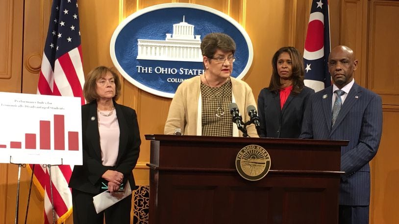 State Sen. Peggy Lehner addresses the issue of school suspensions, supported by (from left) State Sen. Gayle Manning, Cincinnati Schools Superintendent Laura Mitchell and State Sen. Cecil Thomas. JEREMY P. KELLEY / STAFF