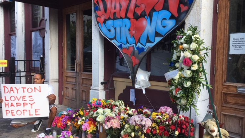 A memorial near Ned Peppers bar in the Oregon District, photographed Aug. 7. THOMAS GNAU/STAFF