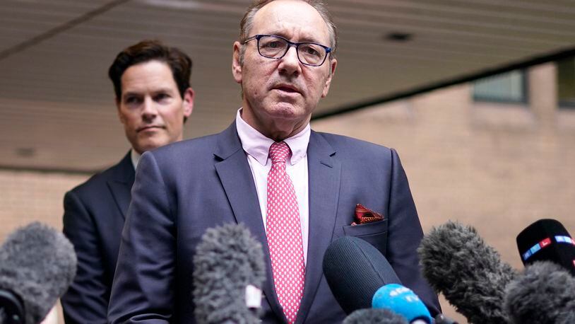 FILE - Actor Kevin Spacey addresses the media outside Southwark Crown Court in London, Wednesday, July 26, 2023. Spacey, the Oscar-winning actor, has denied new allegations of inappropriate behavior from men who will feature in a documentary on British television that is due to be released on May, 6-7, 2024. (AP Photo/Alberto Pezzali, File)