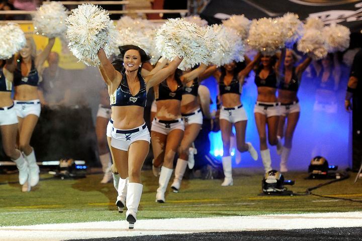 NFL cheerleaders perform at preseason games
