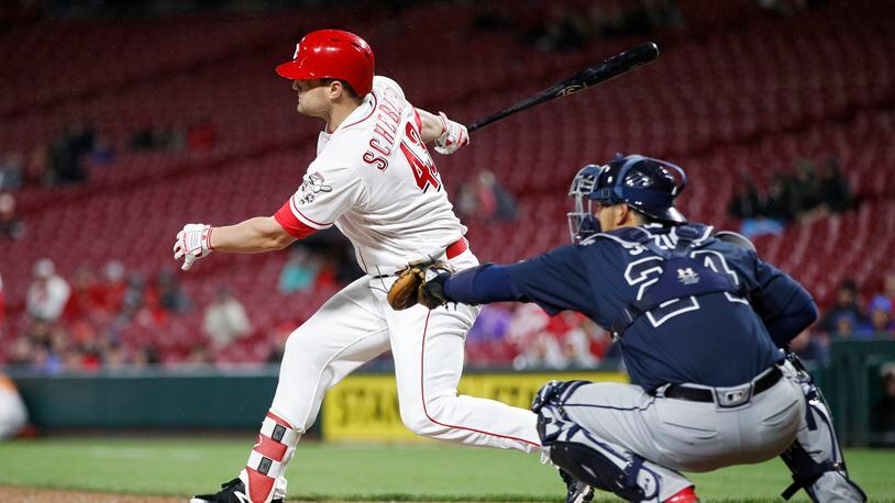 CINCINNATI, OH - APRIL 23: Scott Schebler #43 of the Cincinnati Reds singles to drive in a run in the eighth inning of a game against the Atlanta Braves at Great American Ball Park on April 23, 2018 in Cincinnati, Ohio. The Reds won 10-4. (Photo by Joe Robbins/Getty Images)