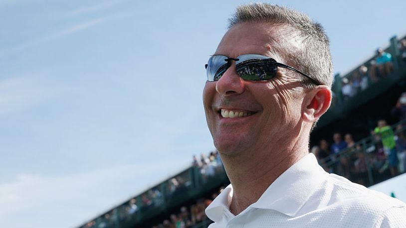SCOTTSDALE, AZ - JANUARY 28:  Urban Meyer, head football coach at  Ohio State University,  looks up to the gallery on the 16th hole during the pro-am prior to the start of the Waste Management Phoenix Open at TPC Scottsdale on January 28, 2015 in Scottsdale, Arizona.  (Photo by Scott Halleran/Getty Images)