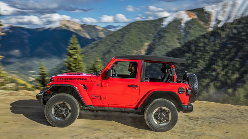 This photo from Jeep shows the 2021 Jeep Wrangler in its two-door version, a rough and rugged SUV that prioritizes off-road ability above all else. (Courtesy of FCA US via AP)