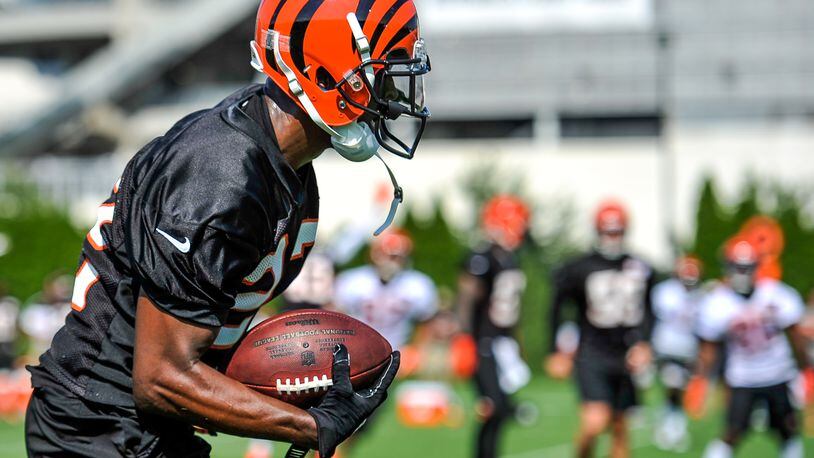 Cornerback William Jackson intercepts a pass intended for Cody Core during the first day of Cincinnati Bengals Training Camp Friday, July 28 at the practice fields beside Paul Brown Stadium in Cincinnati. NICK GRAHAM/STAFF