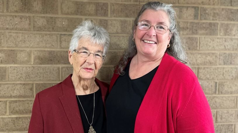Maryjo Phillips, left, was inducted into the West Carrollton Plaza of Fame during a West Carrollton City Council meeting Tuesday, Sept. 28, 2021. She was joined by her daughter, Roberta Phillips (right), during a celebratory reception prior to city council’s regularly scheduled meeting. CONTRIBUTED