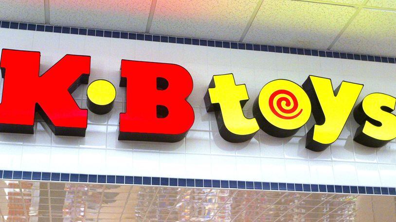 FILE PHOTO: KB Toys signage is visible atop the entranced to its store January 30, 2004 in Norridge, Illinois.