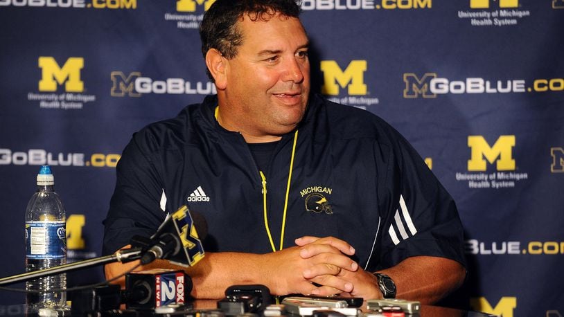 Michigan head football coach Brady Hoke speaks during a news conference following the team’s first NCAA college football practice, Monday, Aug. 8, 2011, in Ann Arbor, Mich. (AP Photo/AnnArbor.com, Melanie Maxwell)