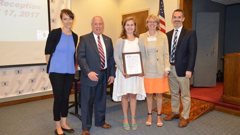 From left: Interact Club Advisor Elizabeth Cameron; Dale Berry, Washington Twp. Board of Trustees vice chair; Noe Camp; Sofie Ameloot, Noe’s mother; Board President Scott Paulson. CONTRIBUTED