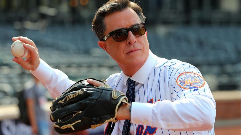 Comedian and talk show host Stephen Colbert plays catch before a game between the New York Yankees and New York Mets at Citi Field on June 8, 2018 in the Flushing neighborhood of the Queens borough of New York City. (Photo by Rich Schultz/Getty Images)