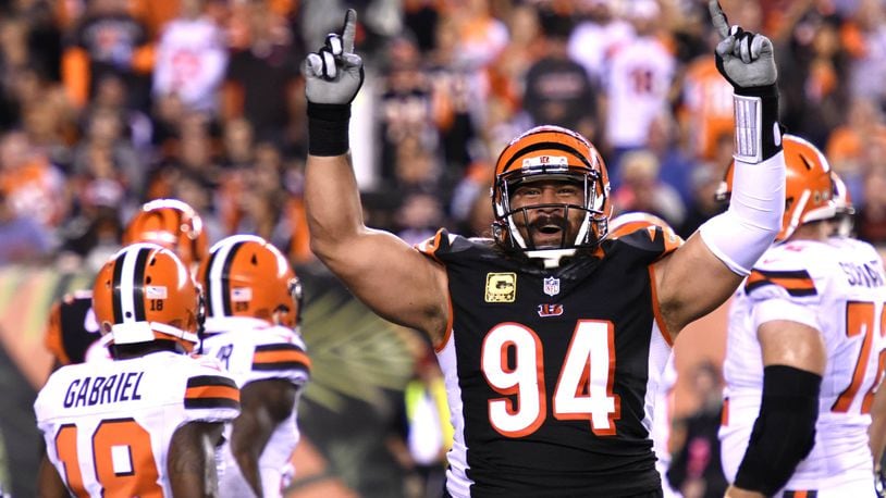 The Cincinnati Bengals defensive tackle Domata Peko gets the crowd pumped up as they host the Cleveland Browns Thursday, Nov. 5 at Paul Brown Stadium in Cincinnati. NICK GRAHAM/STAFF
