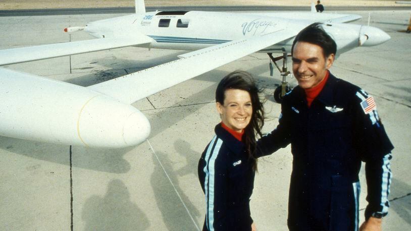 FILE - Co-pilots Dick Rutan, right, and Jeana Yeager, no relationship to test pilot Chuck Yeager, pose for a photo after a test flight over the Mojave Desert, Dec. 19, 1985. Rutan, a decorated Vietnam War pilot, who along with copilot Yeager completed one of the greatest milestones in aviation history: the first round-the-world flight with no stops or refueling, died late Friday, May 3, 2024. He was 85. (AP Photo/Doug Pizac, File)