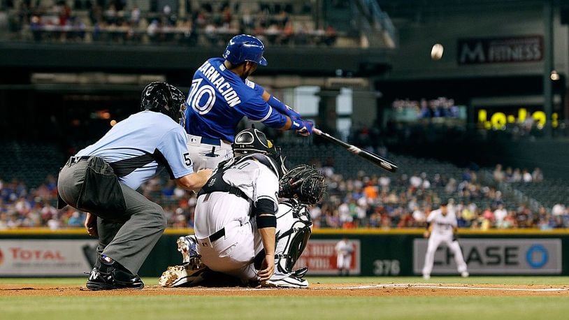 PHOENIX, AZ - JULY 19: Edwin Encarnacion #10 of the Toronto Blue Jays hits a a fly ball to center field against the Arizona Diamondbacks during the first inning of a MLB interleague game at Chase Field on July 19, 2016 in Phoenix, Arizona. (Photo by Ralph Freso/Getty Images)